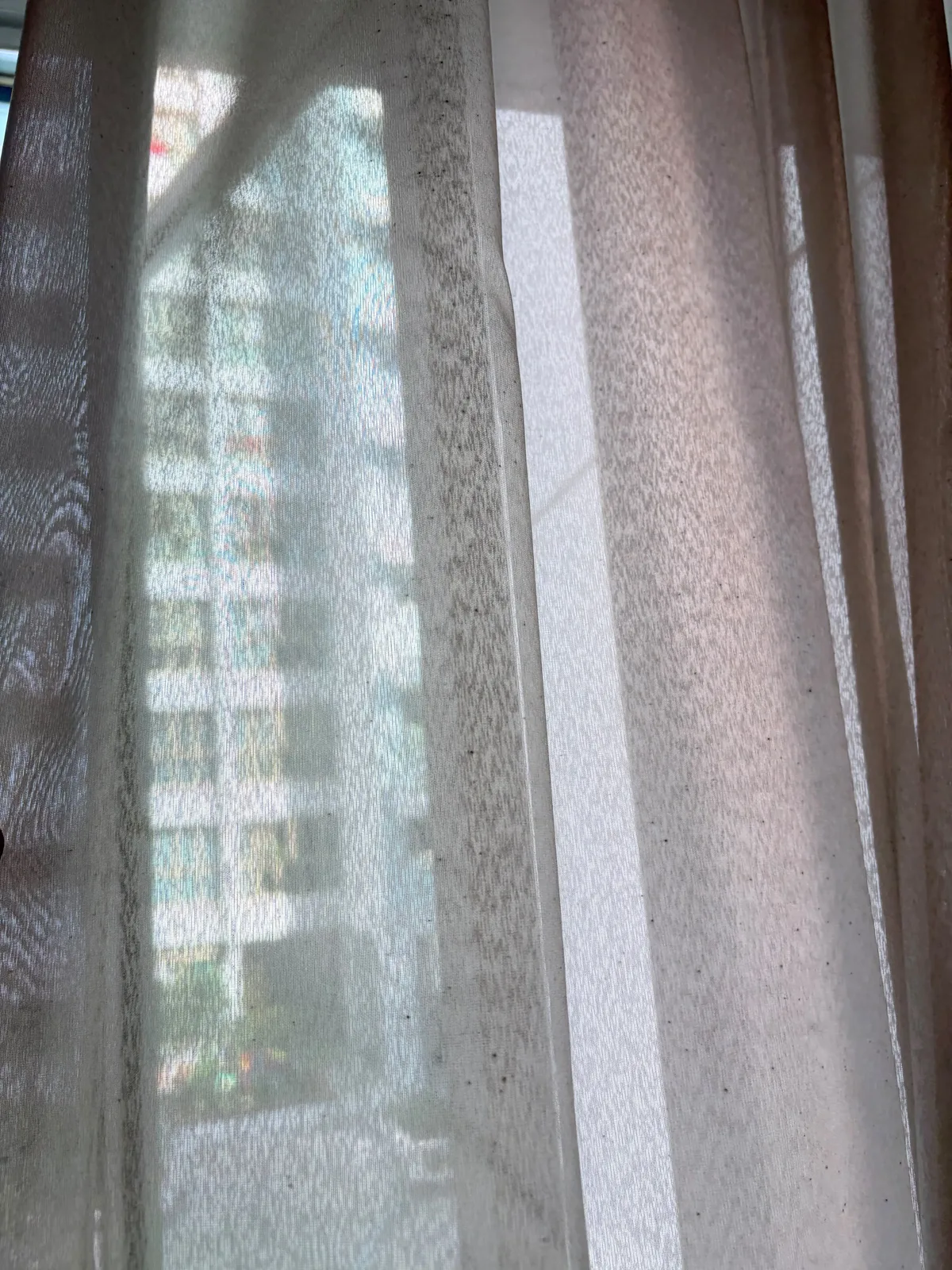 Curtain after deep cleaning โ close-up of refreshed fabric