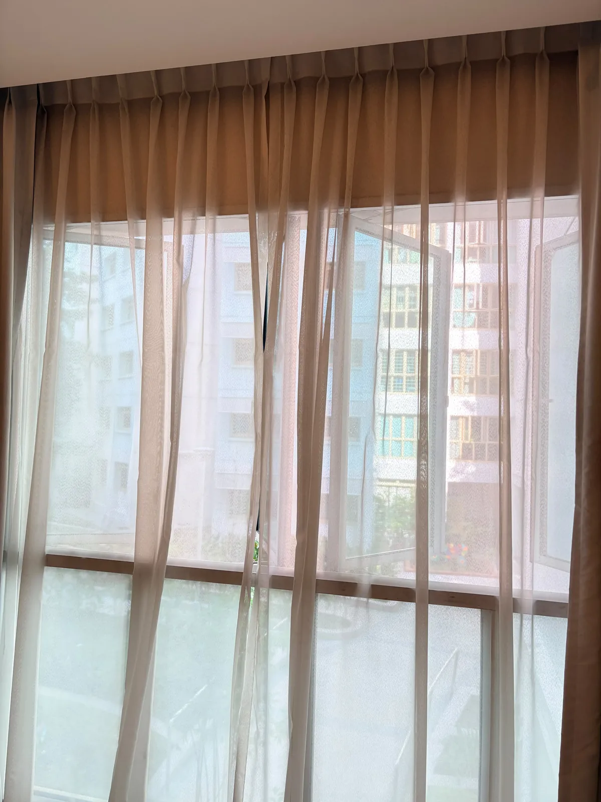 Curtains after deep cleaning โ clean, refreshed full-window result
