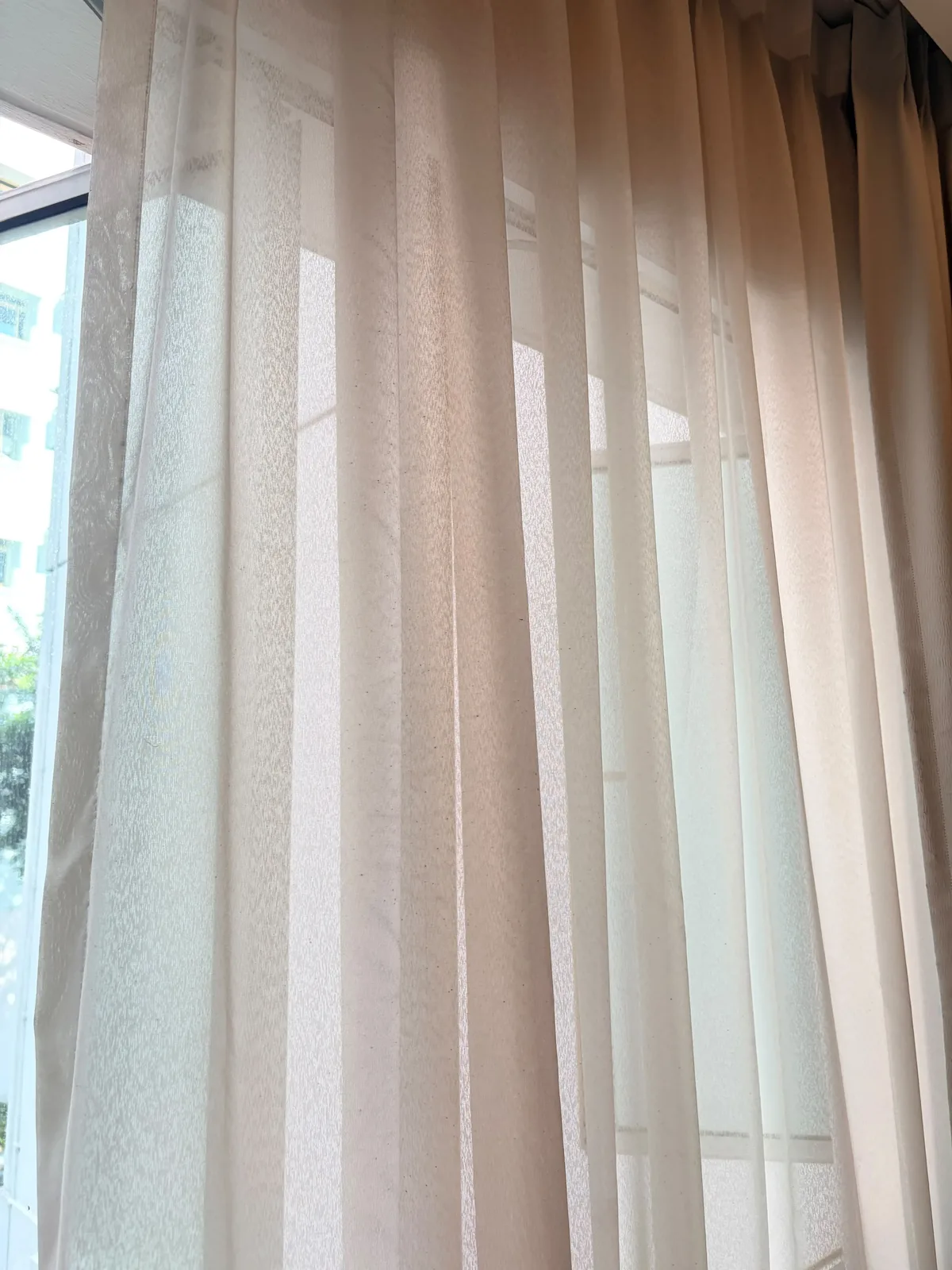 Curtain after deep cleaning โ clean fabric and folds