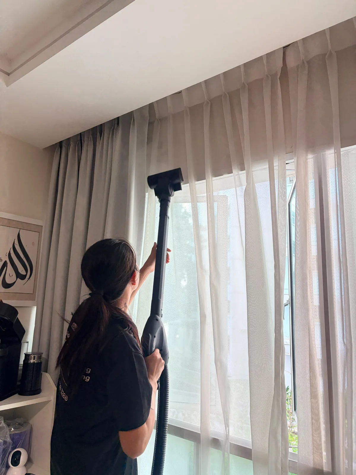 Curtain deep cleaning in progress — full drop treated thoroughly