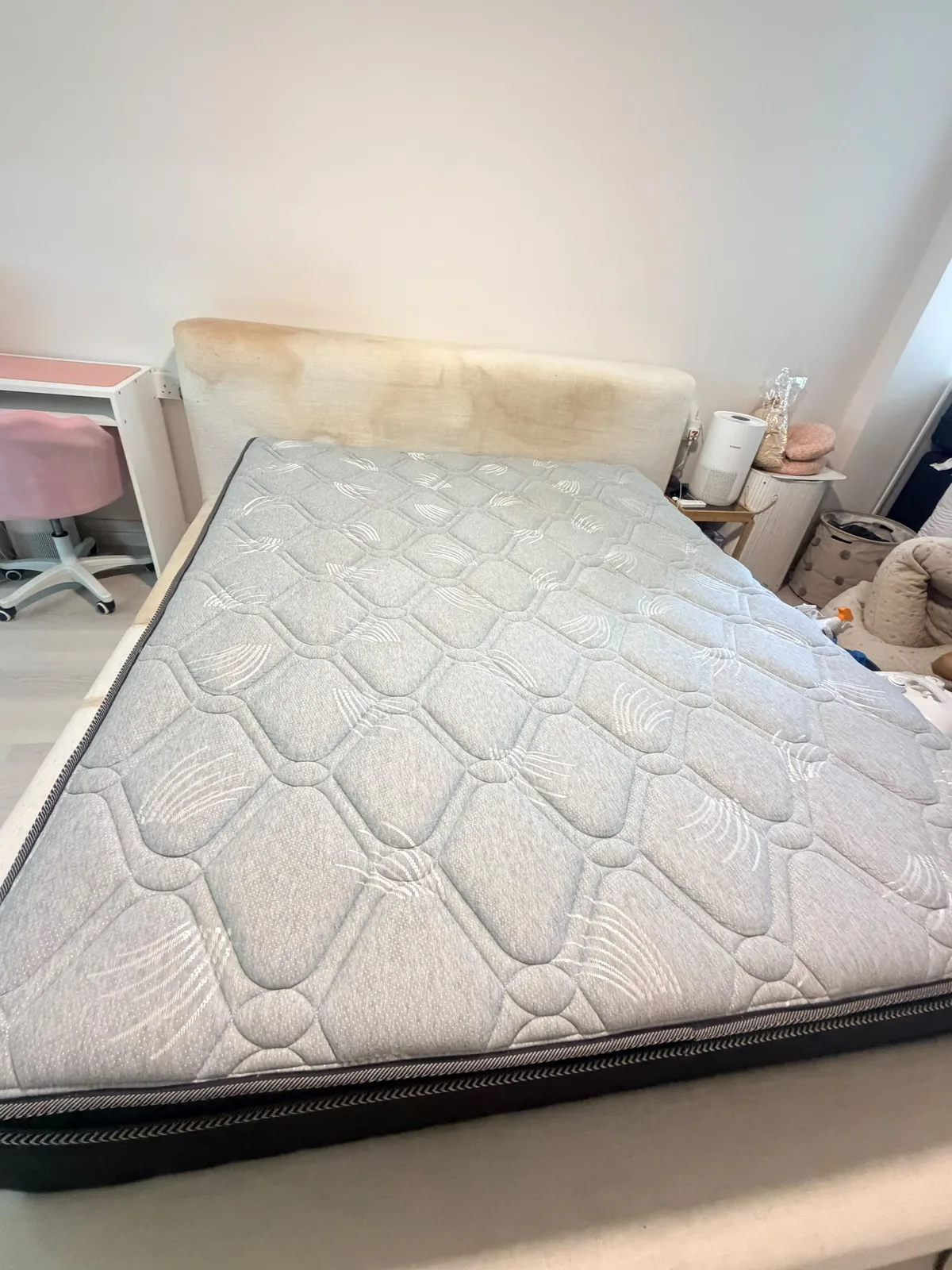 Bedroom mattress before deep cleaning — visible surface staining