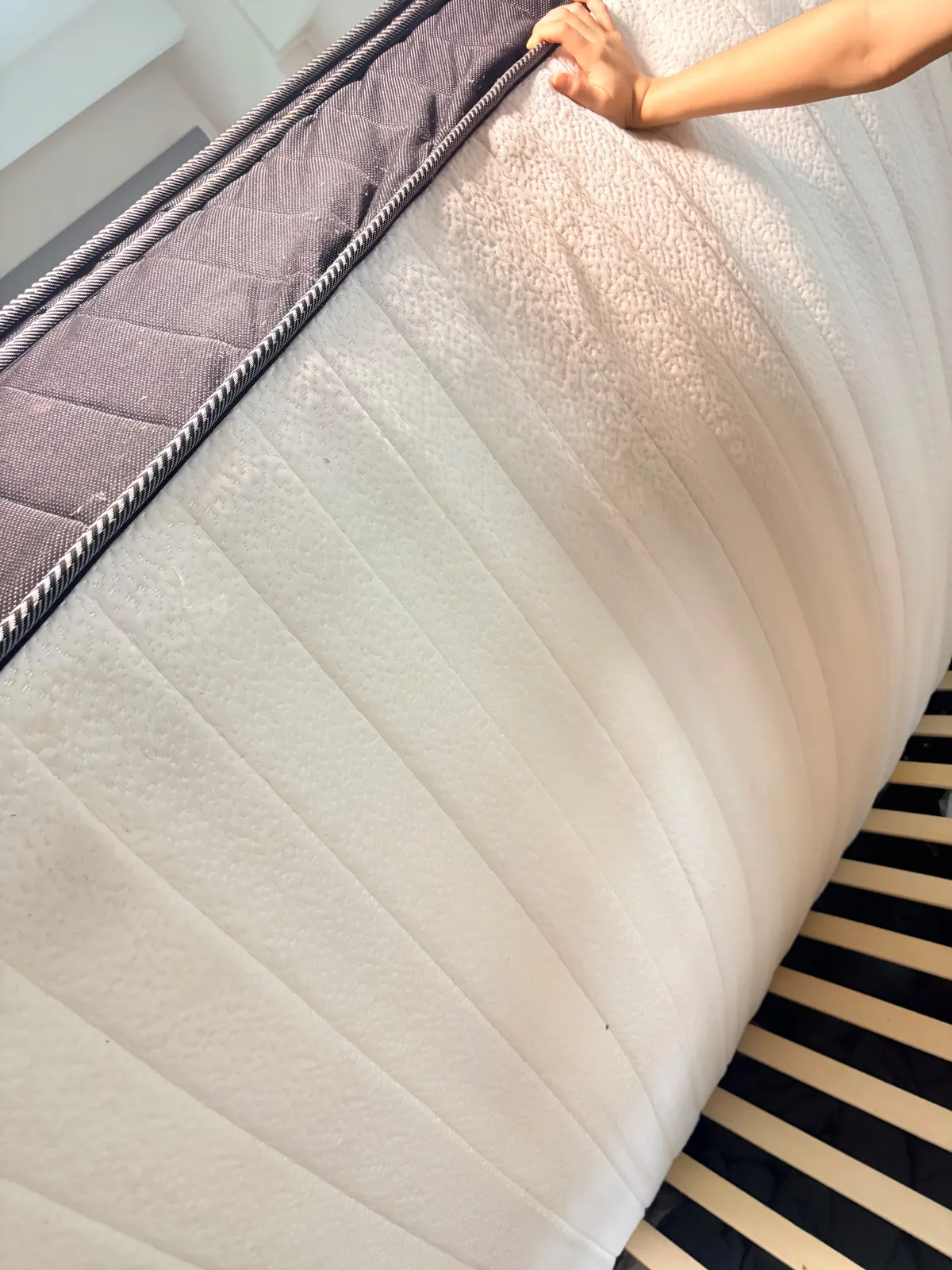 Mattress before deep cleaning — side panel exposed for treatment