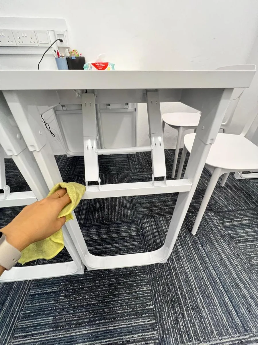 Deep cleaning — table leg and underframe detail