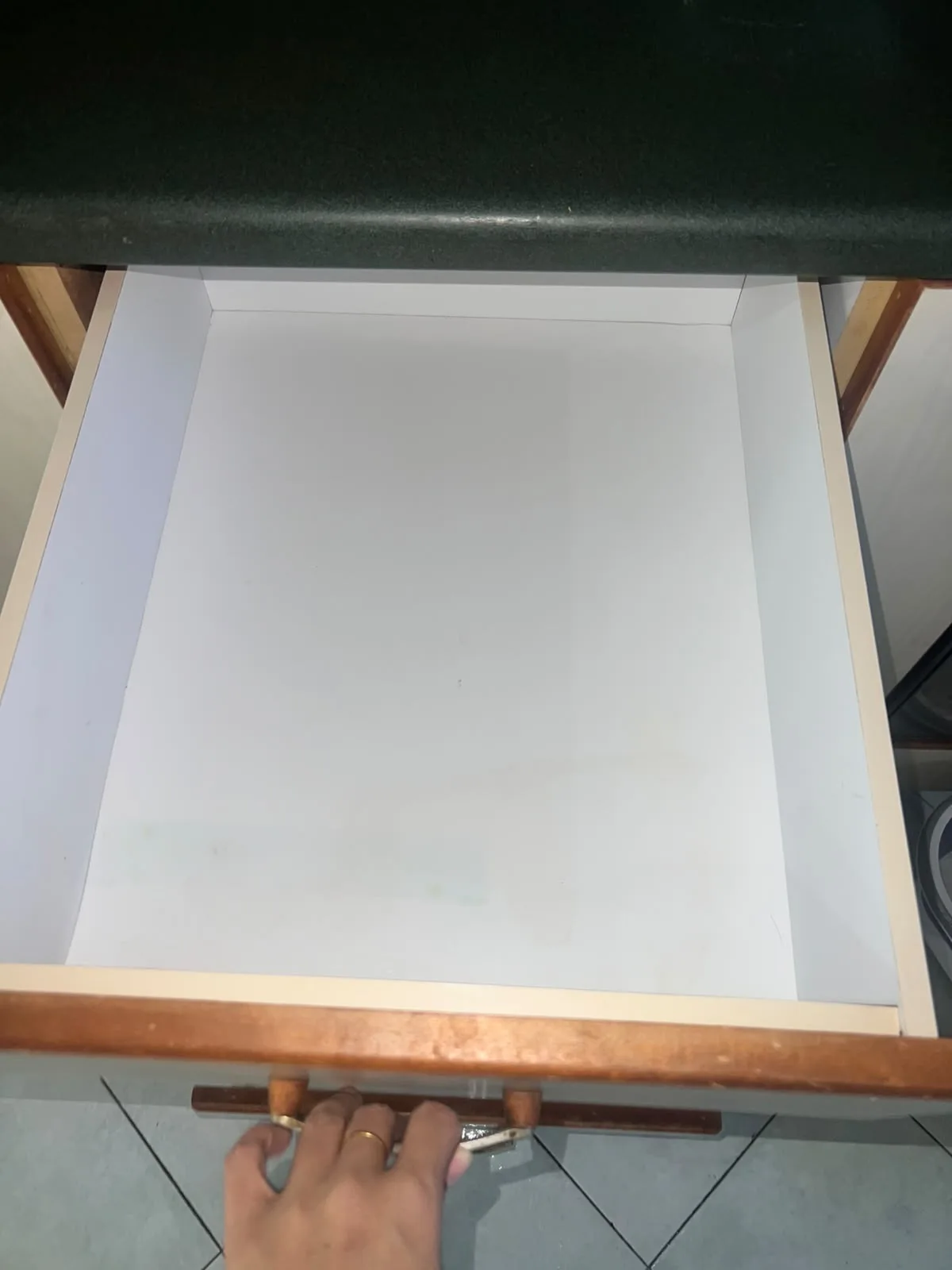 Post-tenancy after cleaning โ kitchen drawer interior wiped spotless