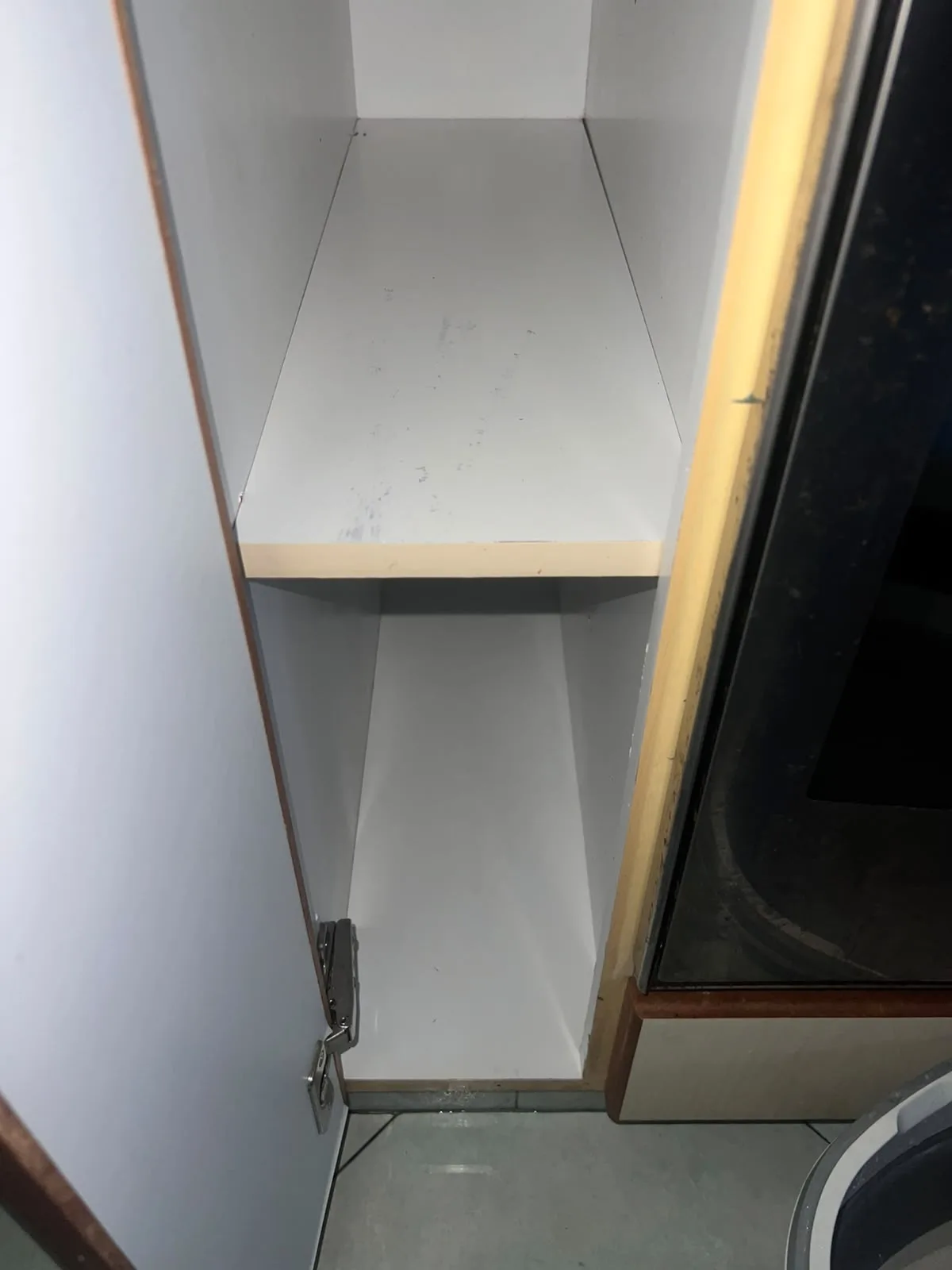 Post-tenancy after cleaning โ tall kitchen cabinet cleaned throughout