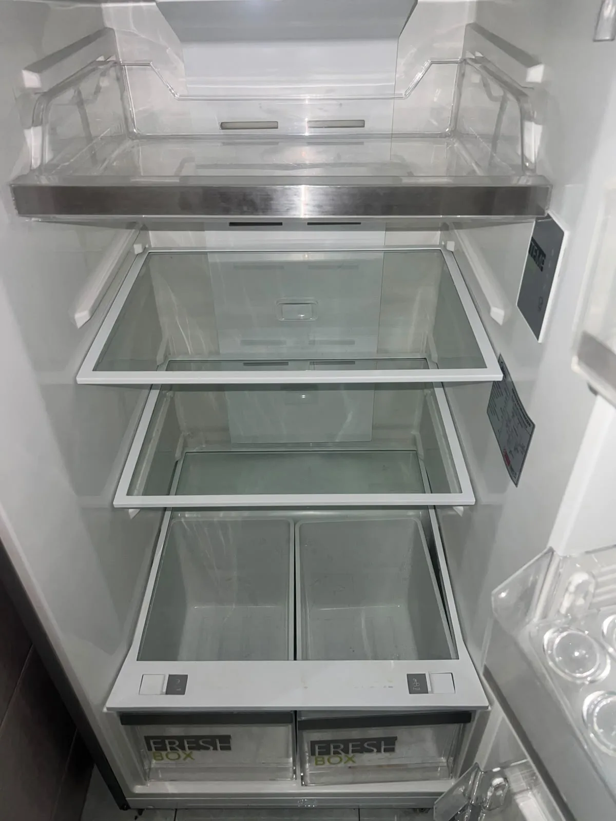 Post-tenancy after cleaning โ refrigerator interior cleaned and sanitised
