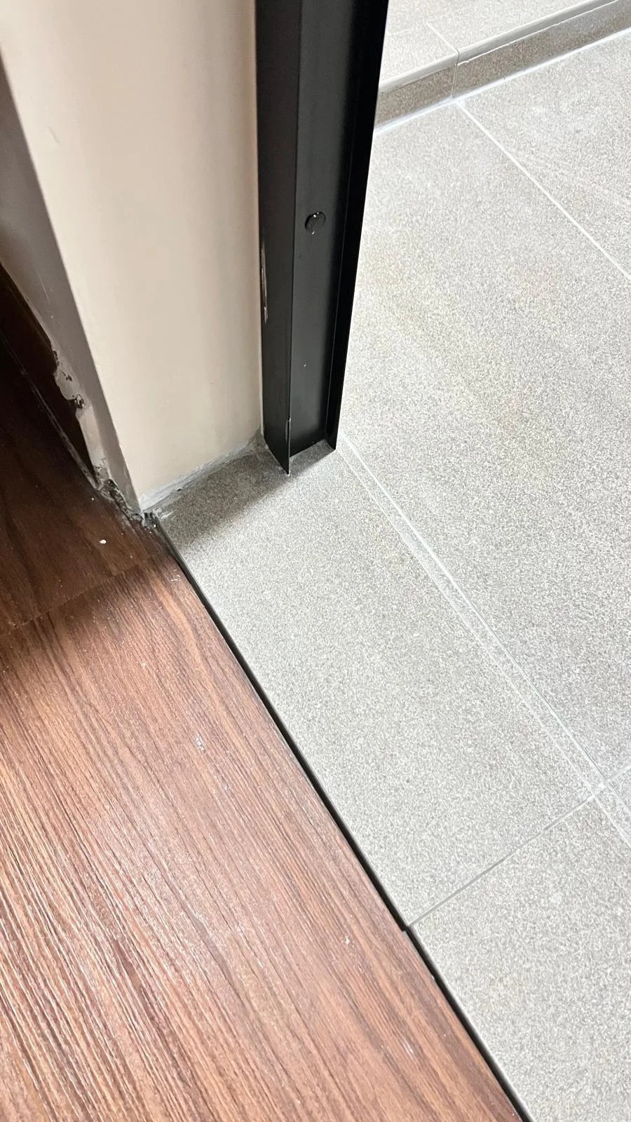 Flooring after post-reno cleaning โ tiles gleaming, haze removed
