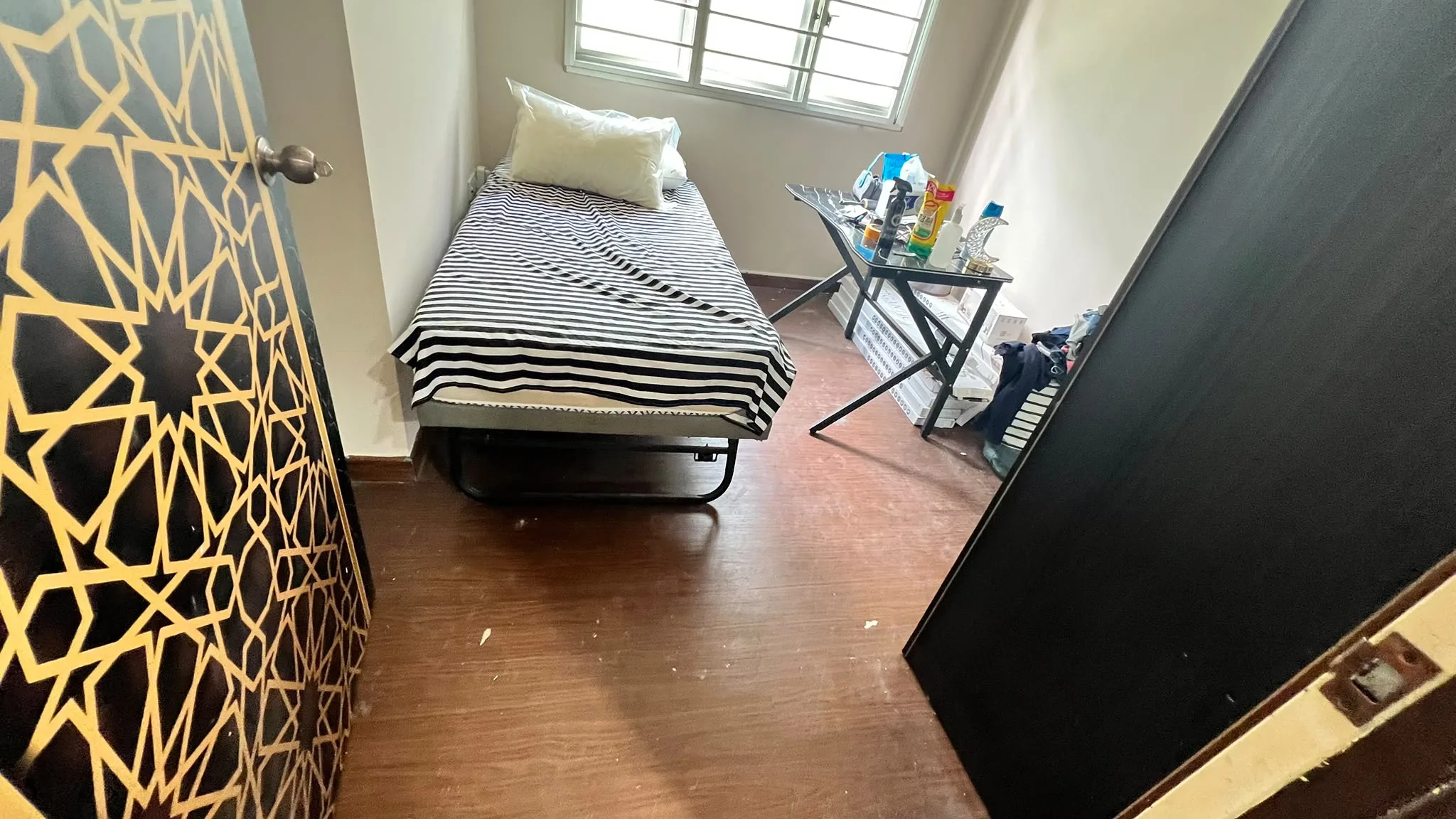 Bedroom before post-reno cleaning โ dust and debris on floor