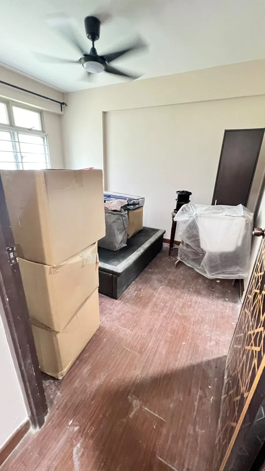 Bedroom before cleaning โ renovation residue on surfaces