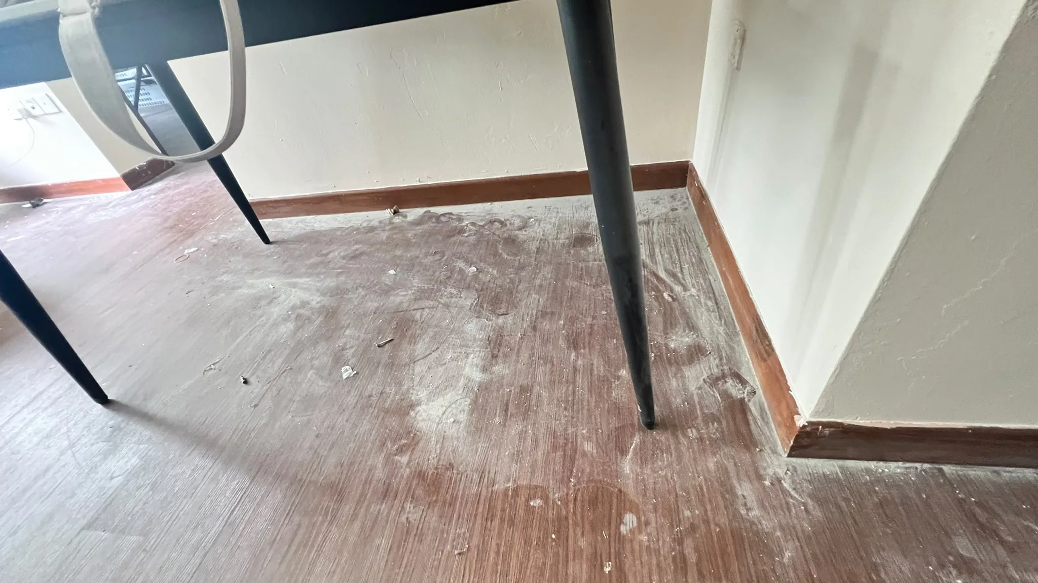 Flooring before cleaning โ tile haze visible throughout