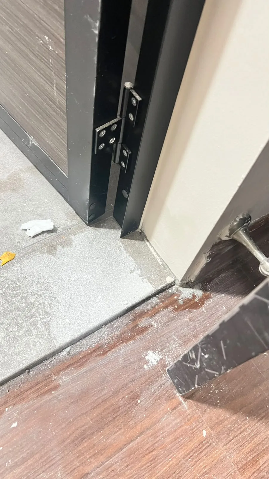 Flooring before cleaning โ dust film on new tiles