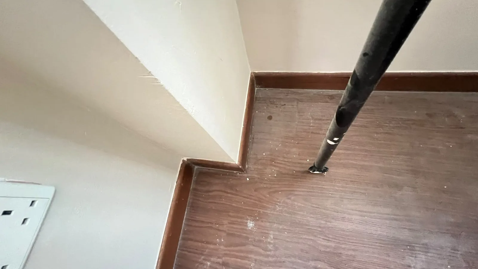 Flooring detail before cleaning โ grout and cement marks