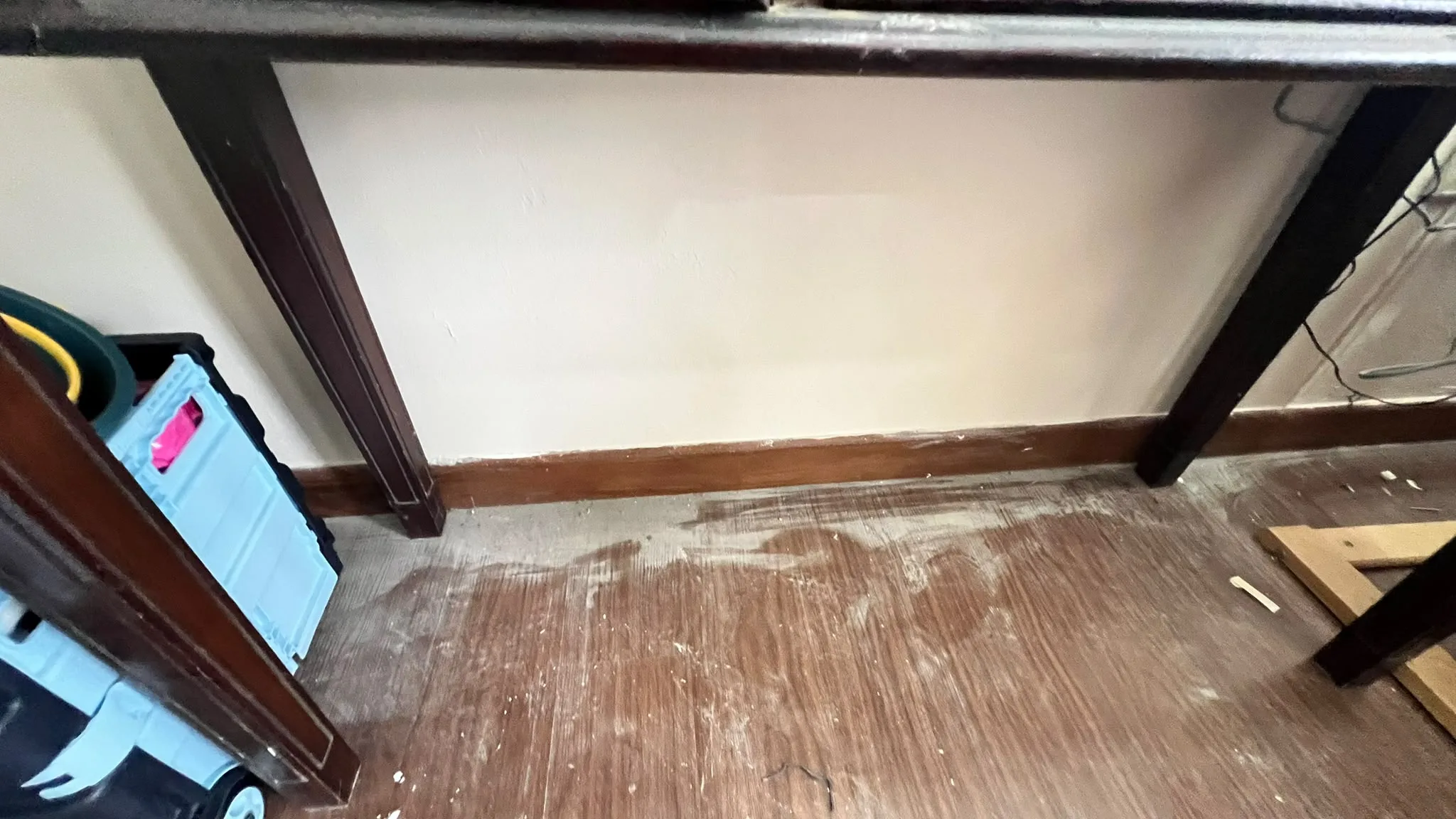 Flooring before cleaning โ renovation debris and grit