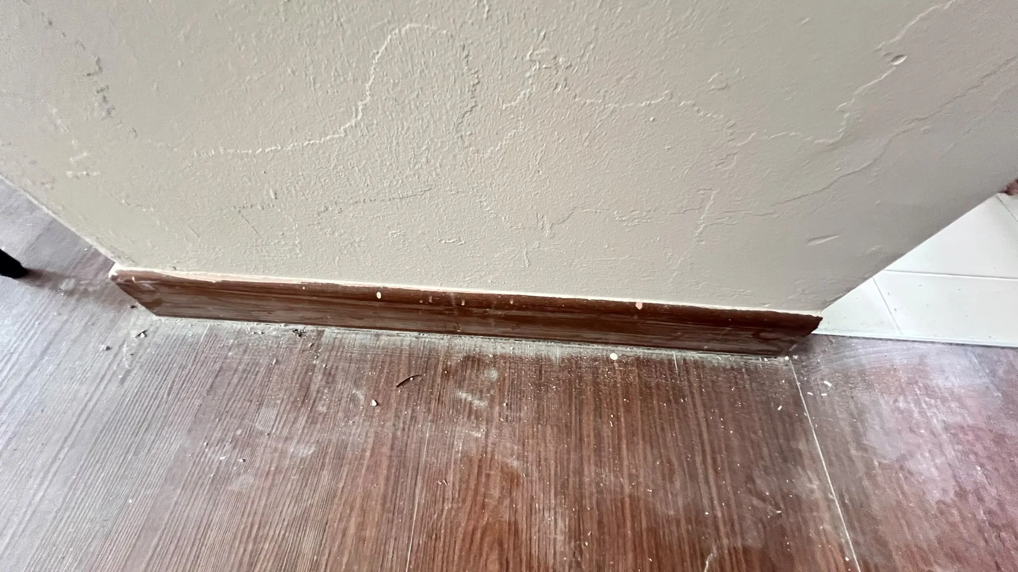 Flooring before cleaning โ contractor residue on floor