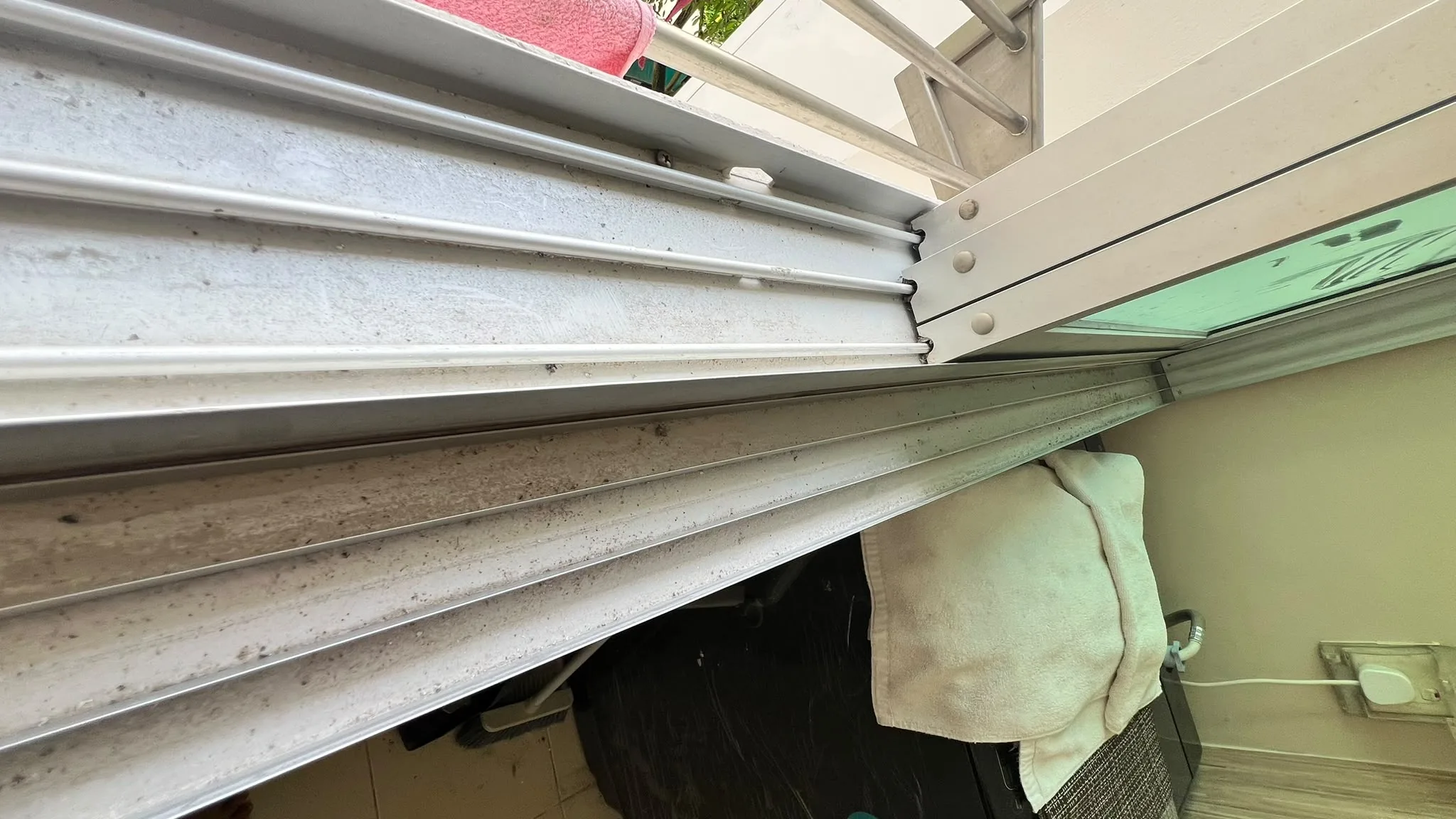 Windows before cleaning โ dust and debris on frames